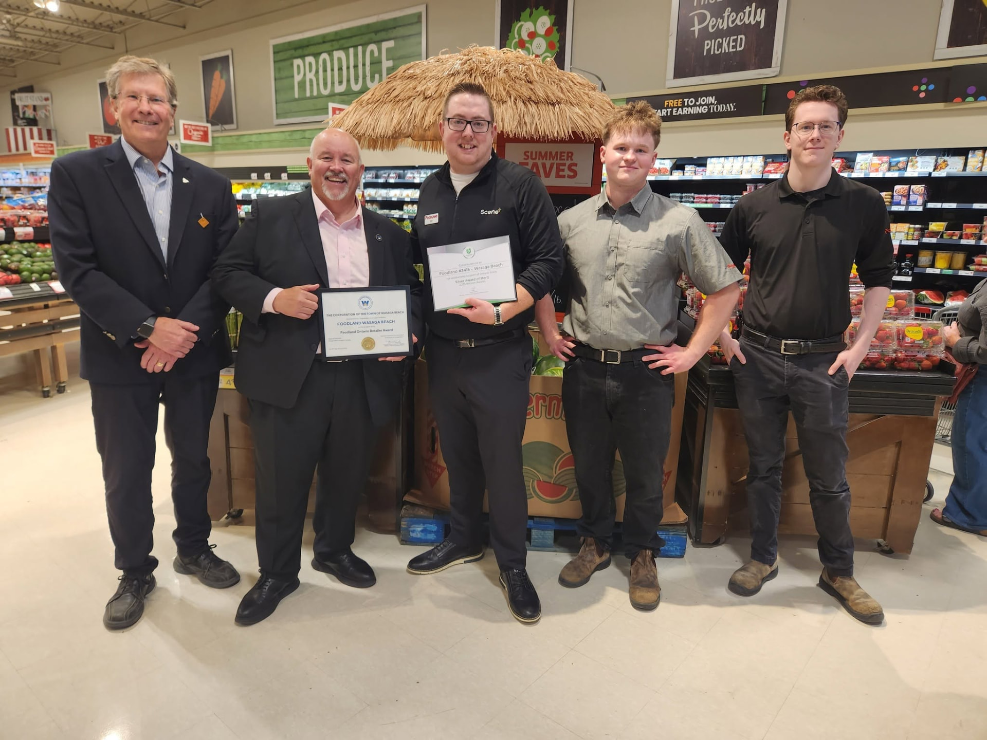 Brian Smith presenting a local retailer award