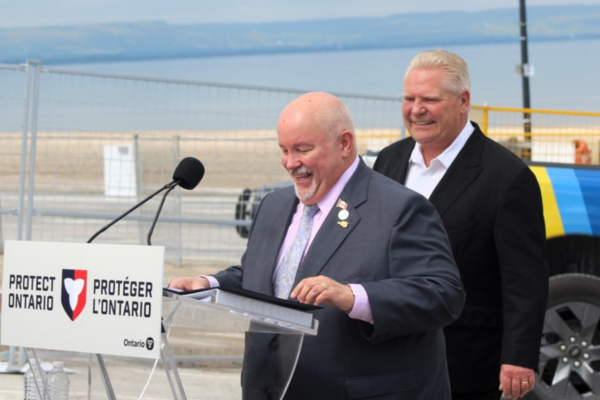 Mayor Brian Smith speaking at a provincial announcement with Premier Doug Ford