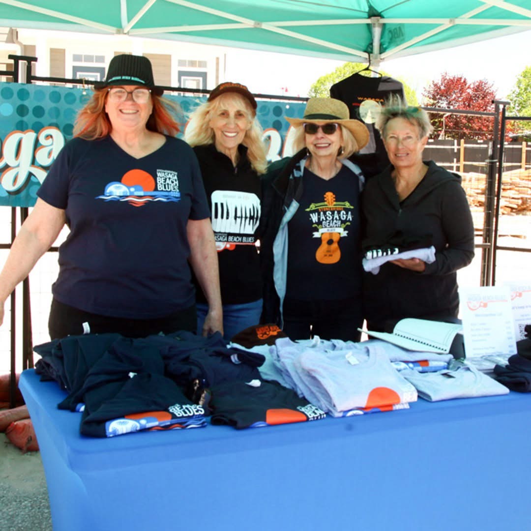 Ellen Timms with volunteers at the Wasaga Beach Blues festival merchandise booth