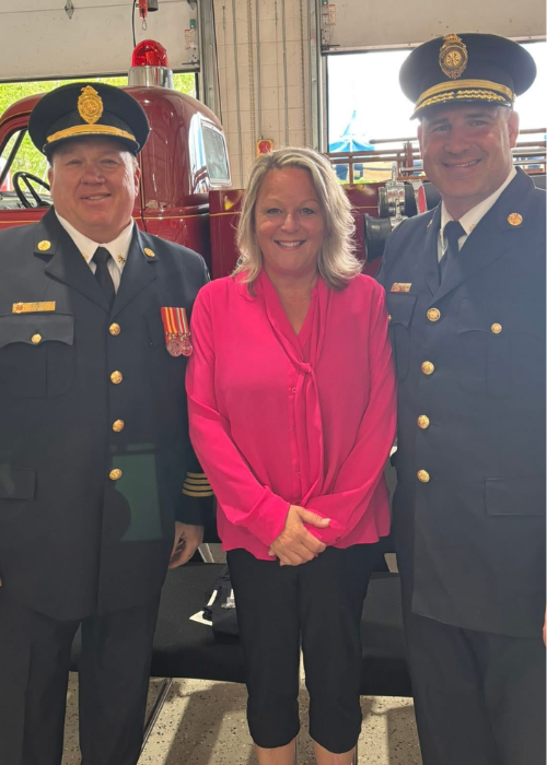 Tanya Snell with local fire chiefs at the Wasaga Beach fire hall