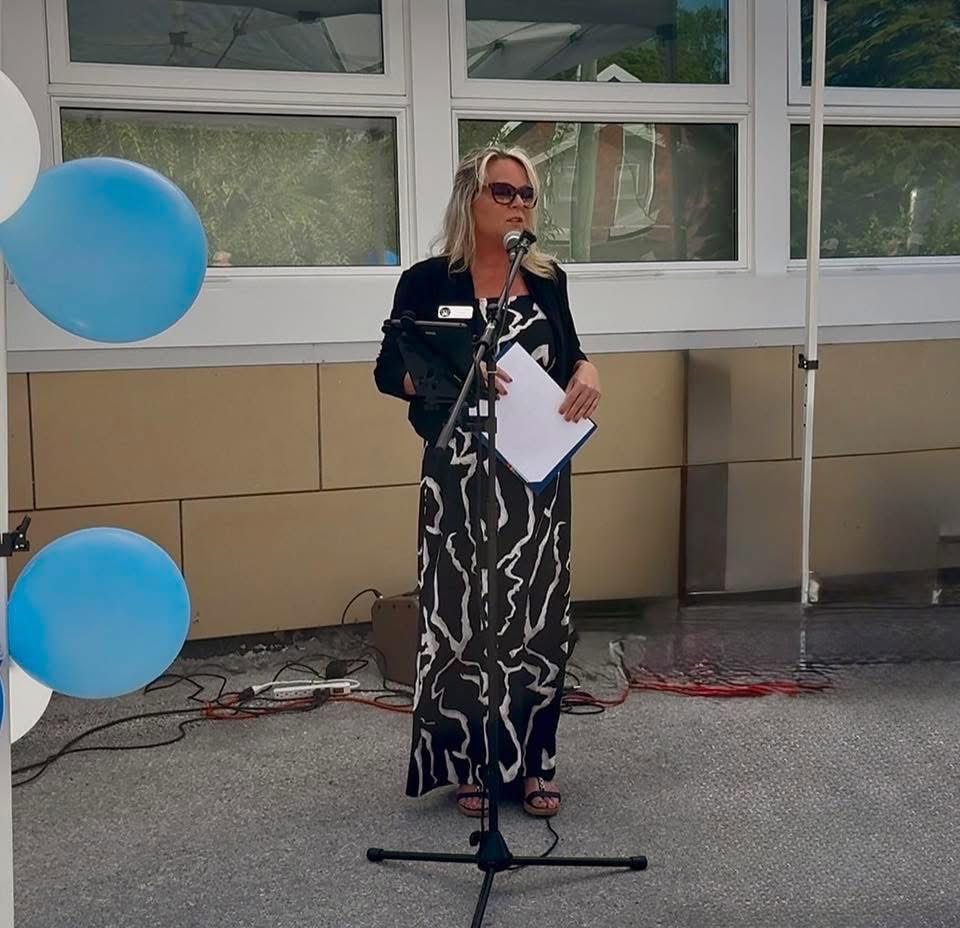 Tanya Snell speaking at a community event